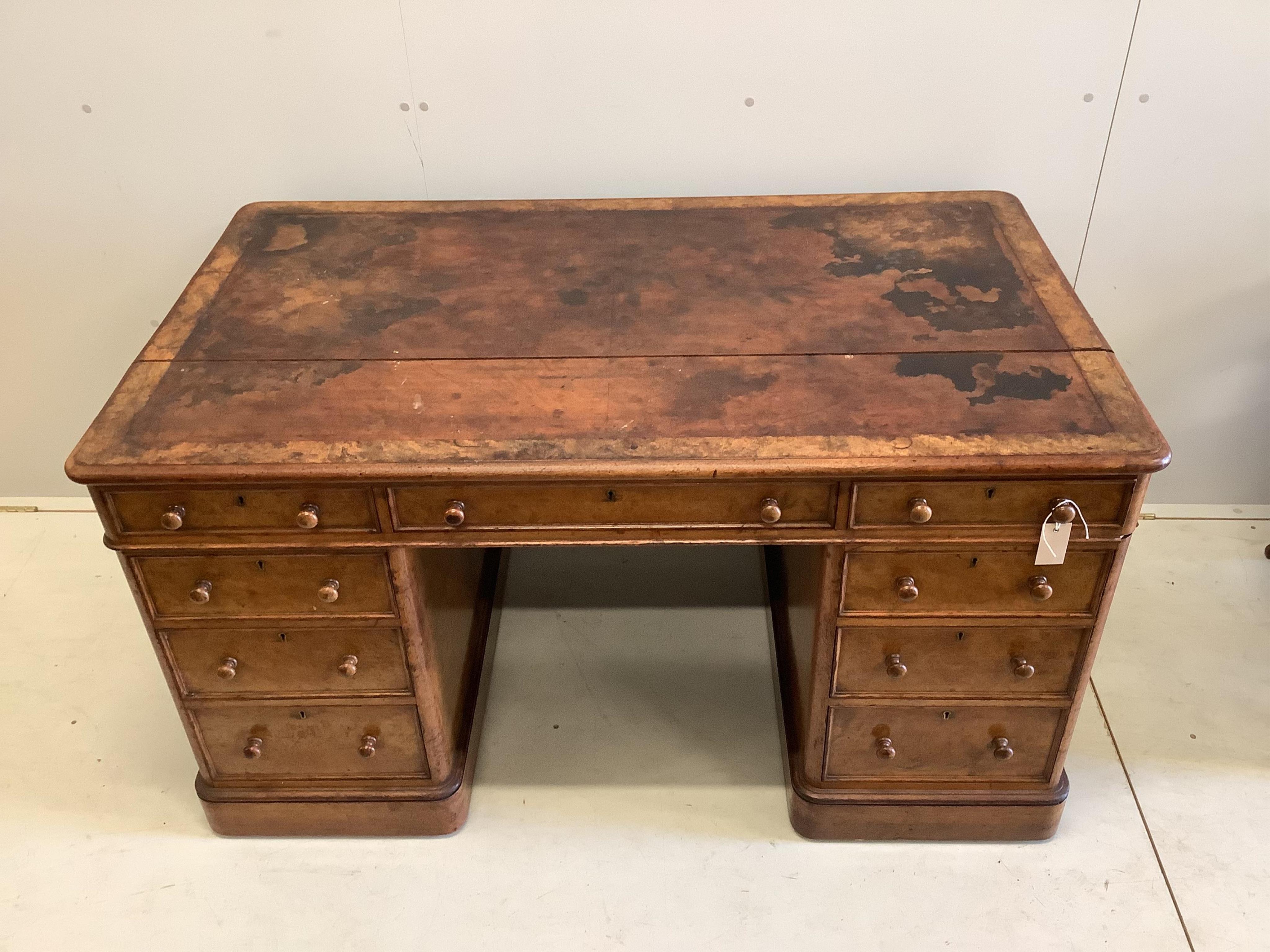 A Victorian burr walnut pedestal desk, width 140cm, depth 80cm, height 74cm. Condition - poor to fair